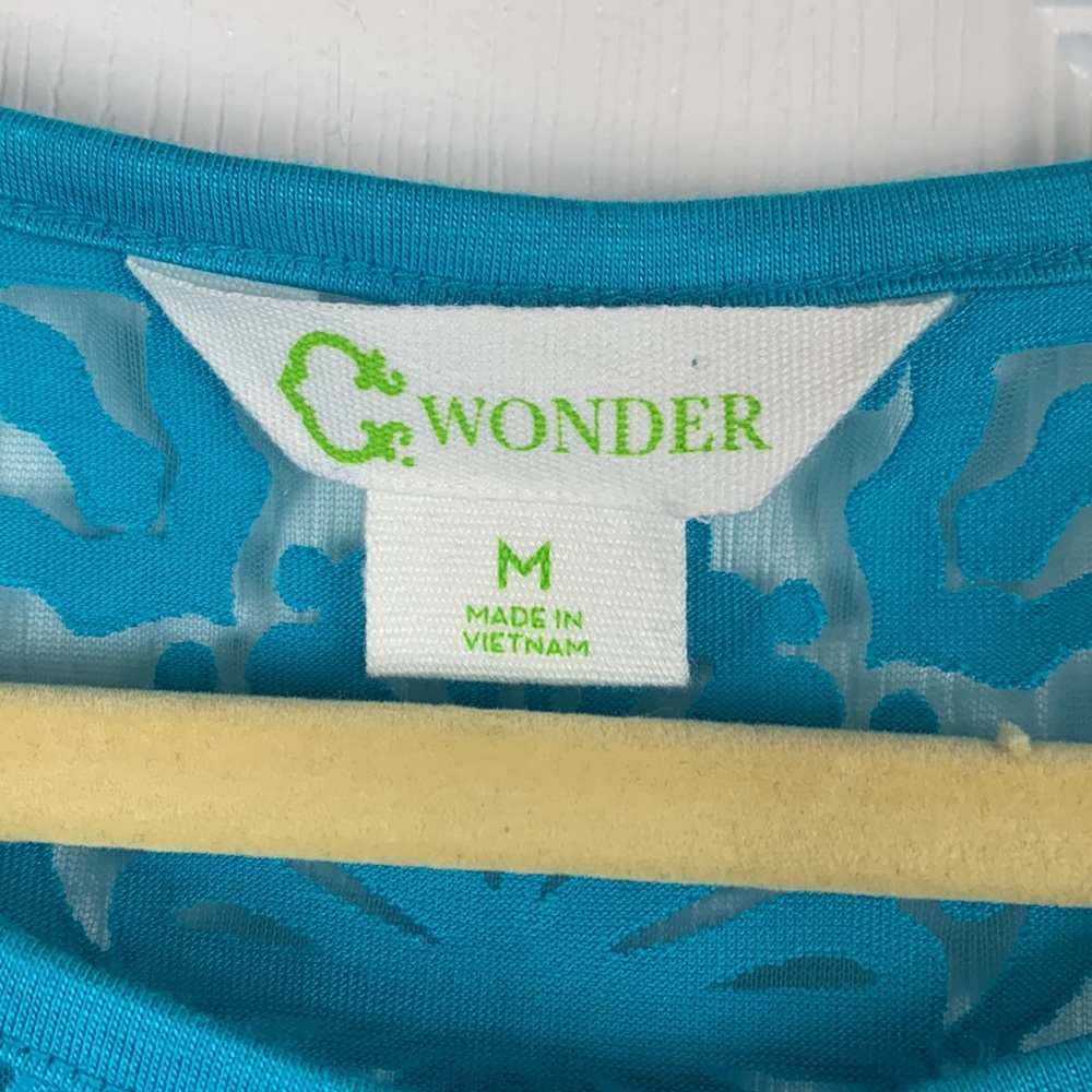 C. Wonder bright teal colored short sleeved top size medium. - Picture 5 of 8